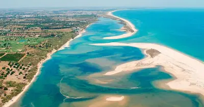 an aerial view of a beach and the ocean at Sunset House Algarve in Faro