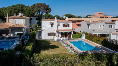 an aerial view of a house with a swimming pool at Villa Fineli in Vilamoura