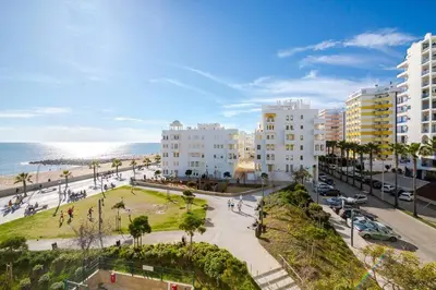 a view of a city with buildings and the ocean at Nascente Sea View @Homesbyfc in Quarteira