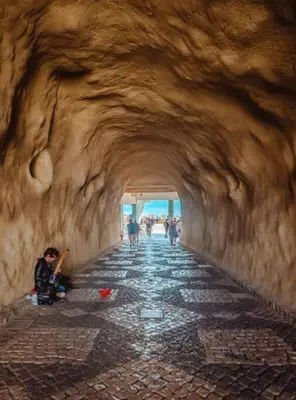 a group of people walking through a tunnel at Albufeira, OLD TOWN - VERASOL N in Albufeira