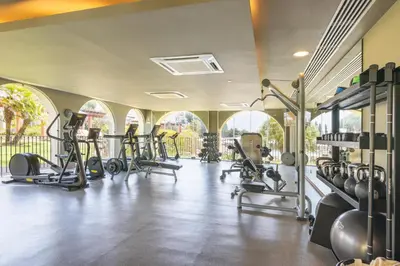 a gym with several treadmills and cardio machines at Vilamoura Marina Lake in Vilamoura