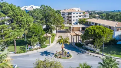 an aerial view of a street with trees and buildings at Pine Sun Park Т1 apartment Falesia beach in Olhos de Água