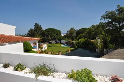 a view of the backyard from the roof of a house at Casa Areias Boutique Apartments in Albufeira