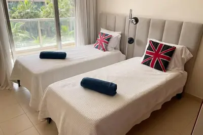 two beds in a hotel room with two at Herdade dos Salgados - 2 Bedroom in Guia