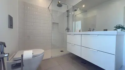 a white balcony with a view of the ocean at Penthouse S.Jorge Seaview T4 in Quarteira