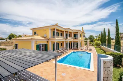 an image of a villa with a swimming pool at Villa Iris in Albufeira