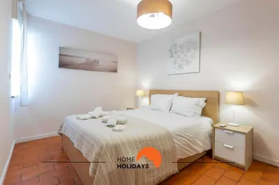 a bedroom with a bed in a room at #165 Liberdade 105 by Home Holidays in Albufeira