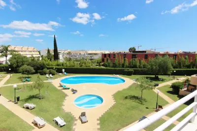 a view of a swimming pool in a park at ViaMar Apartment in Vilamoura