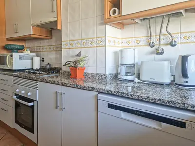 a kitchen with a counter top with a coffee maker at Apart ALGARVE - Piscina - BY BEDZY in Albufeira
