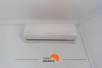 a light on a ceiling in a room at #158 T3 Panorama C by Home Holidays in Albufeira