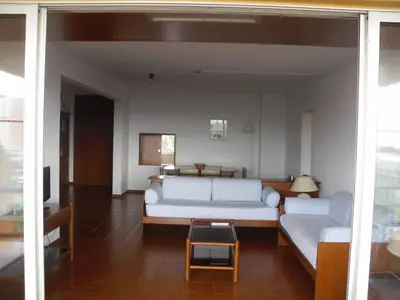 a living room with a couch and a table at Aparthotel Dom Pedro Portobelo in Vilamoura