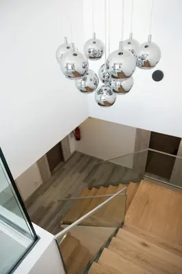 a group of lights hanging from a ceiling at Ria Formosa Guest House in Faro