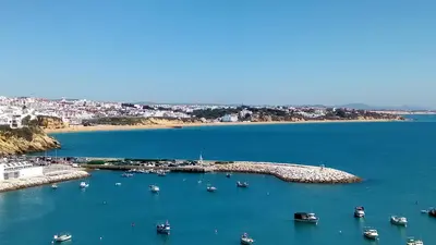 an aerial view of a harbor with boats in the water at Albufeira Traditional Apartments IN VILLA in Albufeira