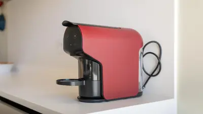 a red appliance sitting on top of a counter at Design Top Floor With Balcony & Pool in Vilamoura