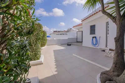 a view of a patio from a house at Avo Vitoria by Innkeeper in Guia