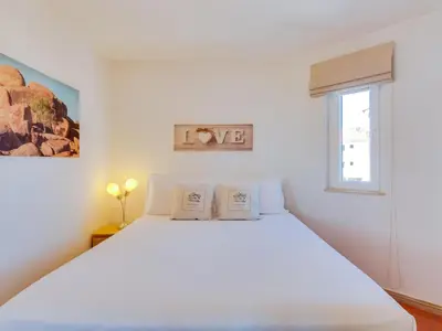 a bathroom with a sink and a toilet in a room at AL - Apartamento Algardia Mar in Vilamoura