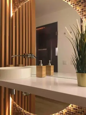 a bathroom with a white sink and a mirror at Great sea view apartment, near the beach, with AC and pools in Albufeira