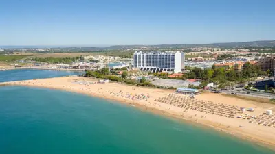 an aerial view of a beach and the ocean at Vilamoura Typical 2 With Pool by Homing in Vilamoura