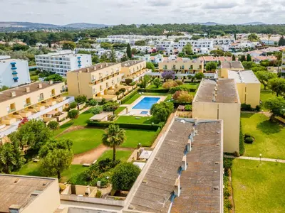 an aerial view of a city with buildings at Mourabel Apartment - S by HelloVacations in Loulé