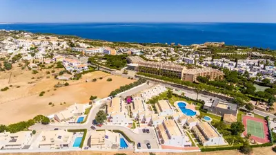 an aerial view of a resort and the ocean at Villa Arrifes by Atlantic Places in Albufeira