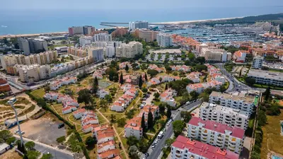 an aerial view of a city with buildings at 1 BDR Vilamoura Escape W Patio by LovelyStay in Quarteira