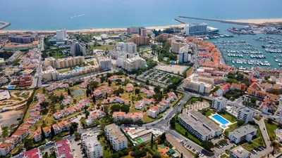 an aerial view of a city with a harbor at 1 BDR Vilamoura Escape W Patio by LovelyStay in Quarteira