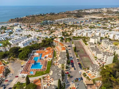 an aerial view of a city with the ocean at Albufeira Jardim Studio with Sea View - Free Wi-Fi - Pool in Albufeira