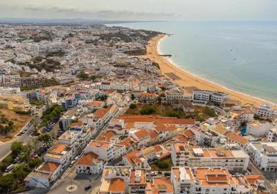 an aerial view of a city and the beach at Albufeira Jardim Studio with Sea View - Free Wi-Fi - Pool in Albufeira