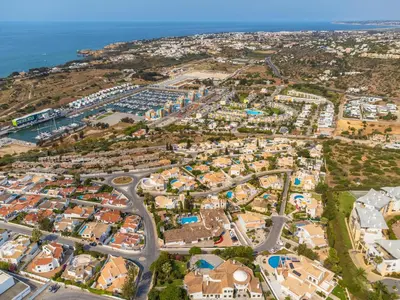 an aerial view of a city next to the ocean at Albufeira Jardim Studio with Sea View - Free Wi-Fi - Pool in Albufeira