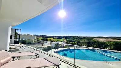 a view of a swimming pool from the balcony of a house at Lake24 CD256- CleverDetails, 3 bedroom apartment, sleeps 6, near to Falesia Beach and the Marina in Vilamoura