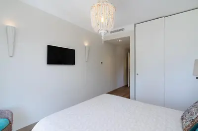 a forest of trees with a view of the ocean at Apartament Belharucas, 400 meters from beach in Albufeira