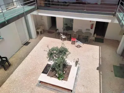 an overhead view of a room with tables and chairs at Albergaria Formosa in Faro