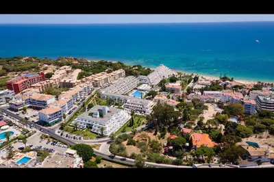 an aerial view of a resort near the ocean at Ocean Oasis by LovelyStay in Albufeira