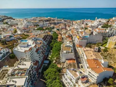an aerial view of a city next to the ocean at Downtown Art Flat in Albufeira