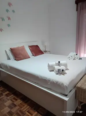 a bed with twoeddy bears on it in a bedroom at The Retreat - O Retiro Algarvio in Faro