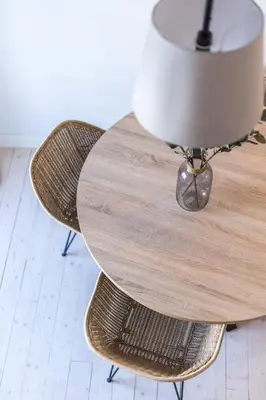 a wooden table with two chairs and a lamp on it at LODO Suites Se - Mezanino room by HD in Faro