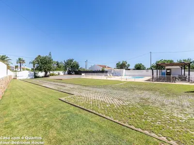 a view of a park with a tennis court at Akisol Albufeira Sun in Albufeira