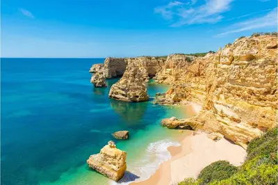 a view of a beach with rocks in the water at SOLAR DO MONTE 4 in Albufeira