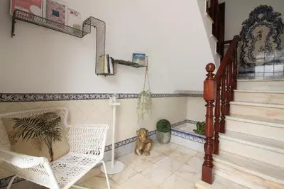 a room with stairs and a tiled floor at Porta 12 in Faro