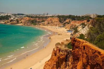 a view of a beach with people on it at Falesia Beach C in Albufeira