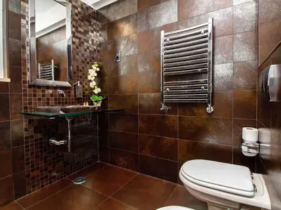a bathroom with a toilet and a sink at Dunas Salgados Apartment by Stay ici Algarve Holiday Rental in Albufeira