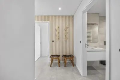a bathroom with a sink and a toilet and a tub at Terracos de Quarteira II Navy by Real Properties in Quarteira