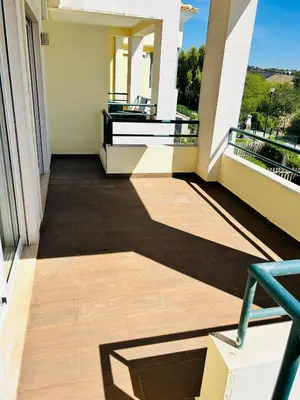 a balcony with a view of a house at Ferreiras Villa in Albufeira