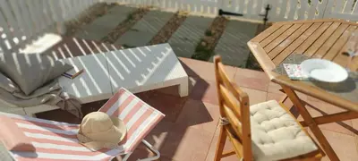 a model of a patio with chairs and a table at Solar da Cotovia in Albufeira