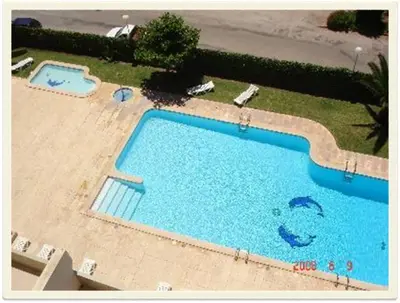 an overhead view of a swimming pool in a resort at Tivoli AP Casino Vilamoura in Vilamoura