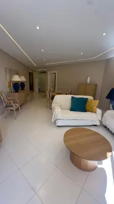 a living room with a couch and a table at Tivoli AP Casino Vilamoura in Vilamoura
