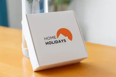 a white kitchen with a stove and a microwave at #189 Montechoro Flat by Home Holidays in Albufeira