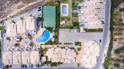 an overhead view of a building with a pool at Thiago Holidays Apartment in Albufeira