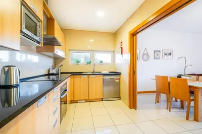 a living room with a couch and a table at Barracuda Oura Dream Apartment in Albufeira