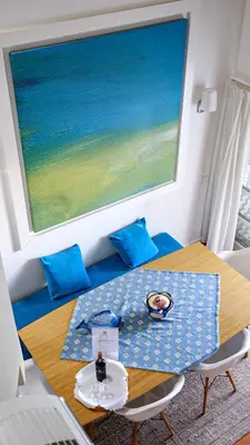 a dining room with a table and a large window at Carpe Diem Vilamoura By Dualhotels in Vilamoura